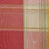swatch of cream and rose plaid fabric